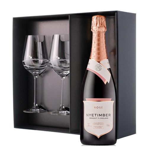 This luxurious gift set is the perfect choice for those who appreciate fine sparkling wine and refined glassware. Featuring a bottle of Nyetimber Rose English Sparkling Wine 75cl paired with two exquisite Venezia Glasses adorned with Swarovski Crystals, this set is beautifully presente